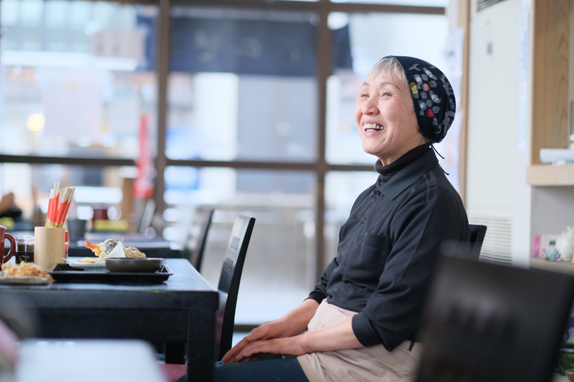 【「地域の人に支えられて今があります。」と笑顔で語る福岡さん】